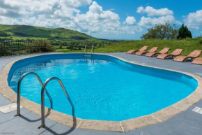 Farmhouse with heated pool Nr Tywyn